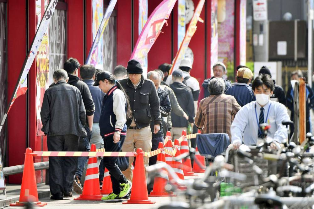 The Latest: Report: Japan's economy to shrink by record 25% - clickorlando.com - city Wuhan - Japan - city Tokyo - city Seoul - Venezuela