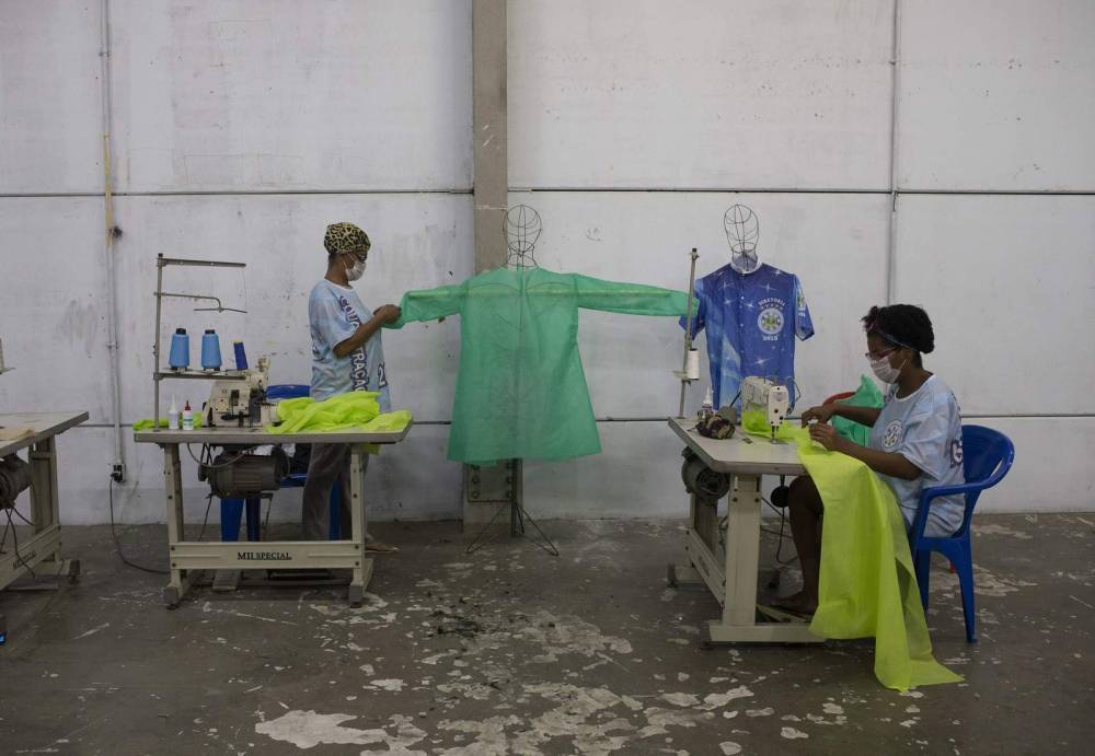 Rio samba schools start sewing scrubs in coronavirus effort - clickorlando.com - city Rio De Janeiro