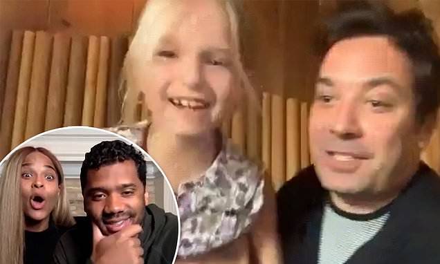 Russell Wilson - Jimmy Fallon's daughter Winnie loses tooth and interrupts interview with Russell Wilson and Ciara - dailymail.co.uk