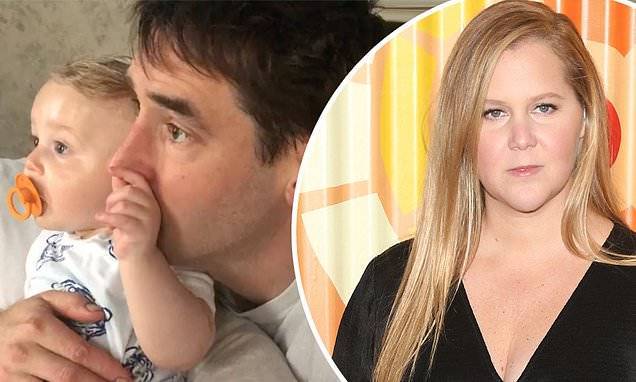 Amy Schumer - Chris Fischer - Amy Schumer shares footage of 11-month-old son Gene enjoying his 'first movie' with Chris Fischer - dailymail.co.uk