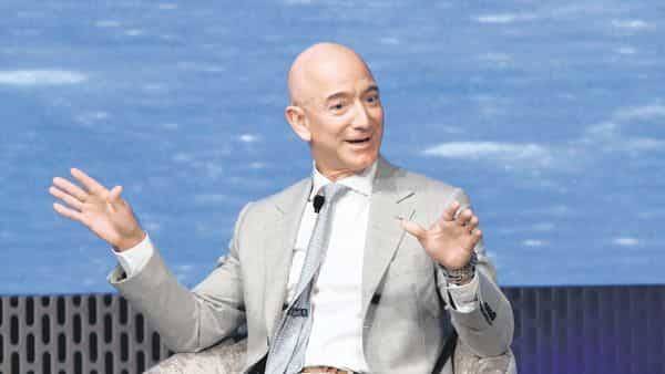 Jeff Bezos - Bernard Arnault - Warren Buffett - Jeff Bezos tops Forbes billionaires list for the 3rd year - livemint.com