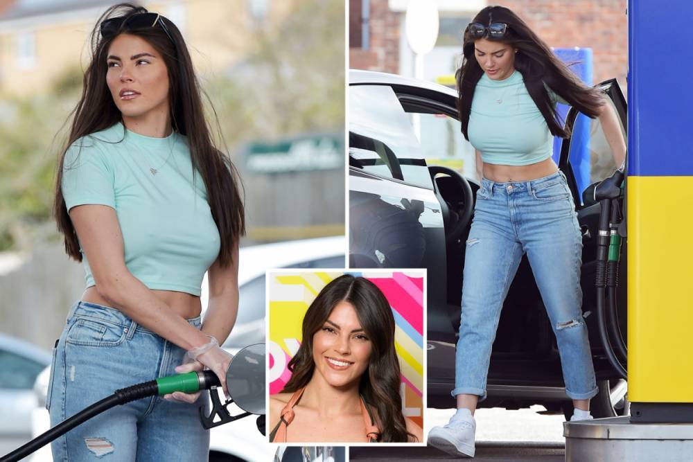 Rebecca Gormley - Michael Griffiths - Love Island’s Rebecca Gormley flashes her abs in a crop top as she wears plastic gloves at petrol station - thesun.co.uk - city Newcastle