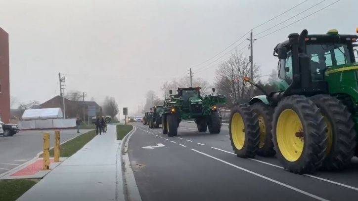 Canadian farmers salute health care workers fighting COVID-19 with tractor parade - fox29.com - Canada - county Ontario - county Thomas