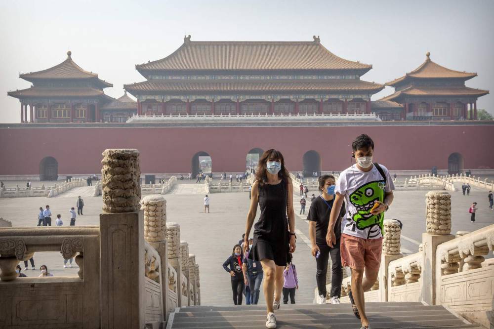 Asia Today: Naruhito performs ritual, Beijing reopens parks - clickorlando.com - city Beijing - Japan - Britain - city Bangkok