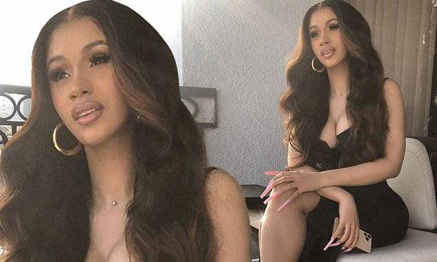 Cardi B puts on a busty display as she gets dressed up in stunning black dress after quarantine wax - dailymail.co.uk