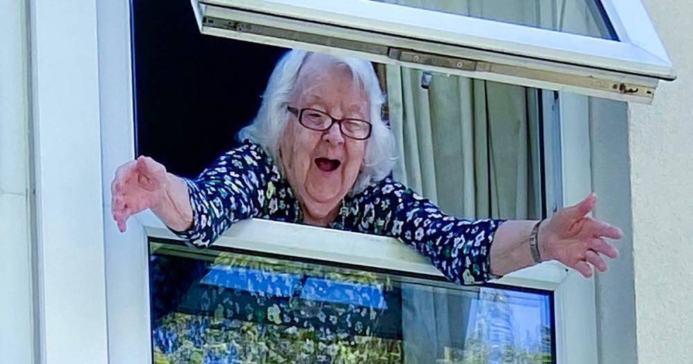 Moment pensioner, 92, throws windows open to finally meet new great-grandchild - mirror.co.uk