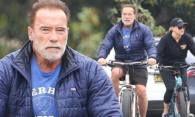 Arnold Schwarzenegger - Heather Milligan - Ralf Moeller - Arnold Schwarzenegger goes on a bike ride with girlfriend Heather Milligan and friend Ralf Moeller - dailymail.co.uk - Los Angeles - state California
