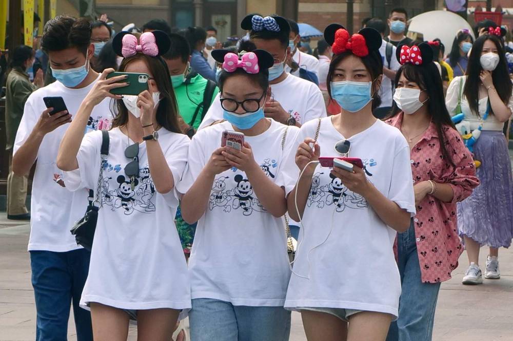 Mi Feng - Asia Today: China cases rise, students back, Disney reopens - clickorlando.com - China - city Wuhan - city Bangkok