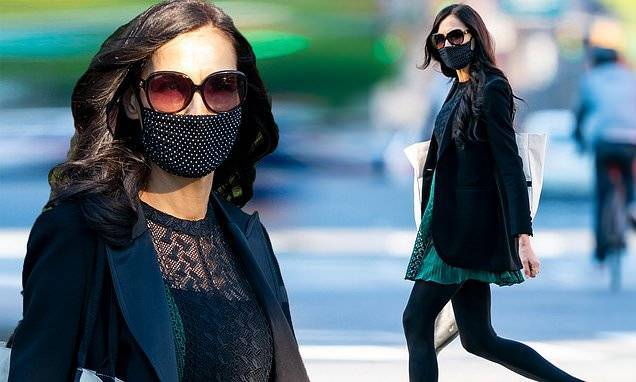 Famke Janssen pairs polka-dot mask with a turquoise and black mini-dress for walk in NYC - dailymail.co.uk - city New York - Netherlands