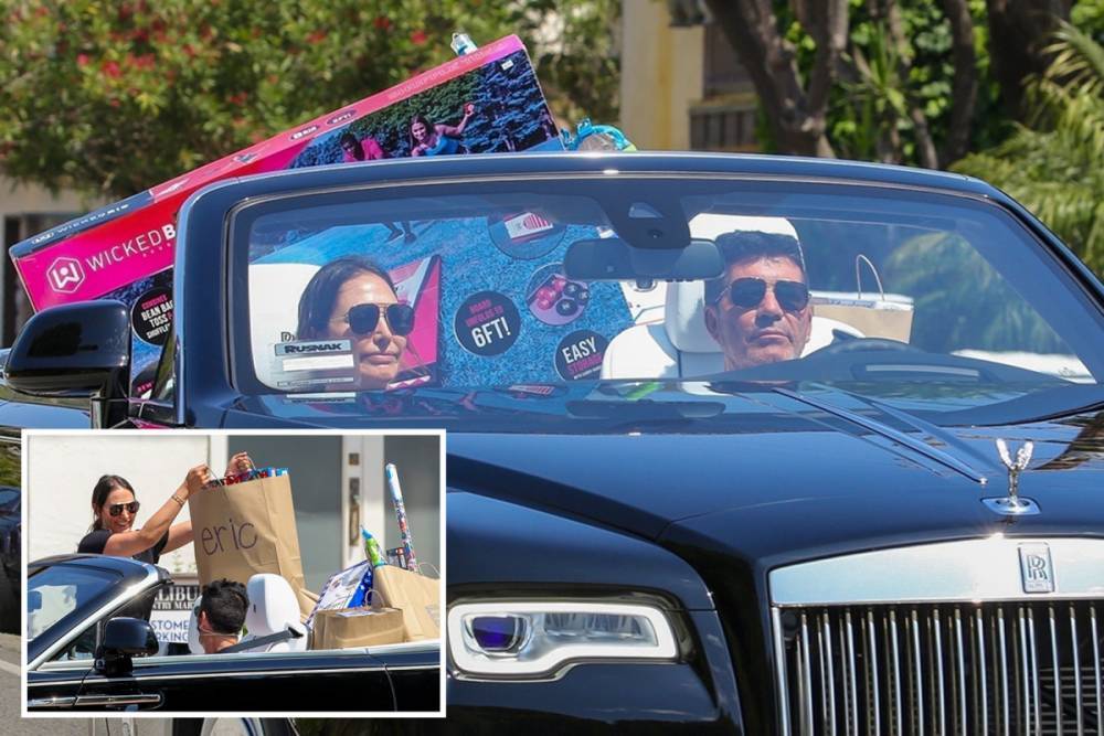 Simon Cowell - Lauren Silverman - Simon Cowell and Lauren pile toys for Eric into their Rolls-Royce as they’re seen for first time since Mel B drama - thesun.co.uk