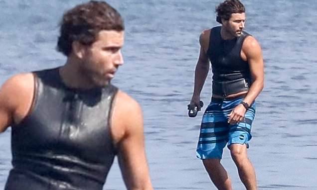 Brody Jenner - Brody Jenner shows off bulging biceps while riding electric surfboard - dailymail.co.uk - city Malibu