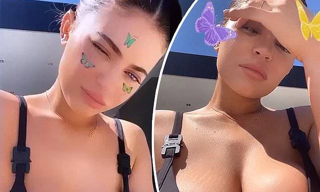 Kylie Jenner - Travis Scott - Kris Jenner - Kylie Jenner poses in a black bikini top as she says she is enjoying another 'pool day' - dailymail.co.uk