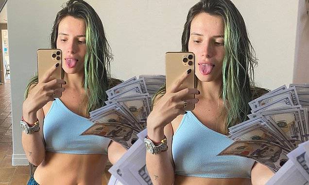 Bella Thorne - Bella Thorne flashes her tummy and several $100 bills - dailymail.co.uk