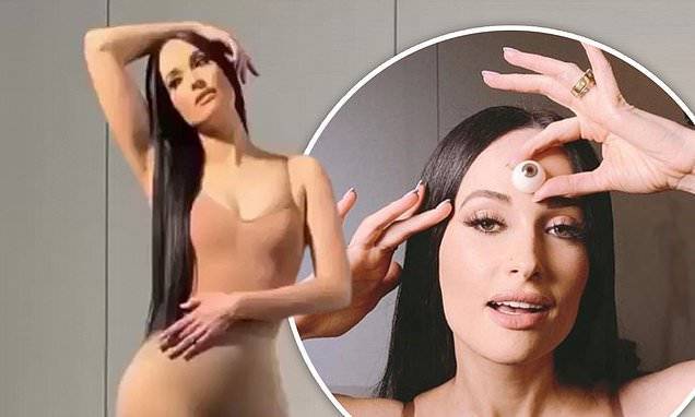 Kim Kardashian - Kacey Musgraves - Kacey Musgraves flaunts fab figure in clinging nude bodysuit from Kim Kardashian's SKIMS line - dailymail.co.uk