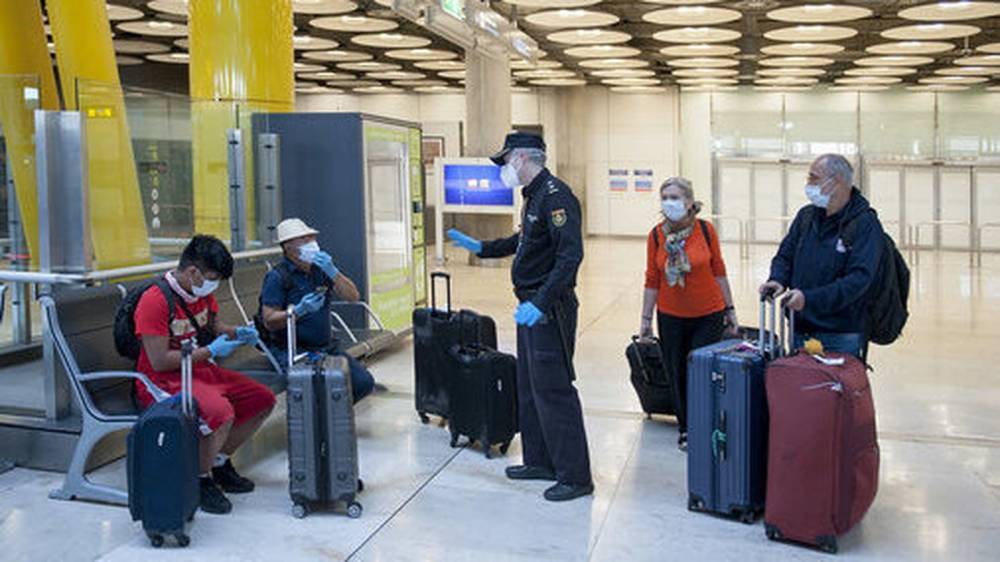 Spain orders two-week quarantine for all international travellers - rte.ie - Spain