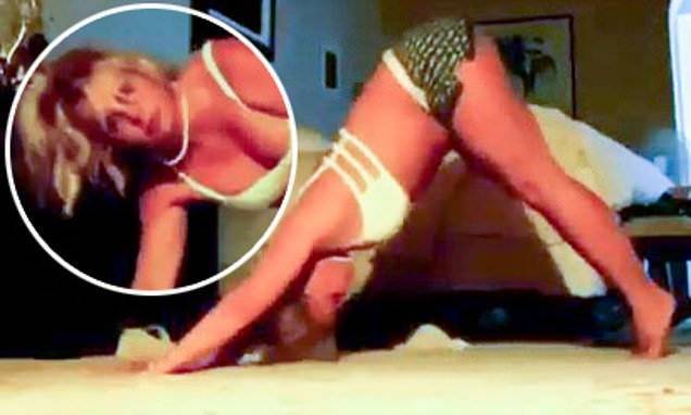 Britney Spears - Britney Spears shows off her toned abs in a sports bra and shorts while doing yoga at home - dailymail.co.uk