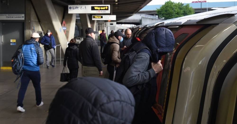 Boris Johnson - Tubes and trains crowded on first day back for workers under new lockdown rules - mirror.co.uk - city Canning