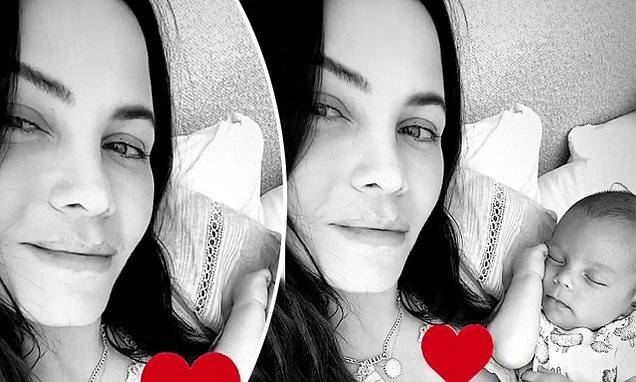 Jenna Dewan is overflowing with love as she tenderly cradles her napping baby boy Callum - dailymail.co.uk