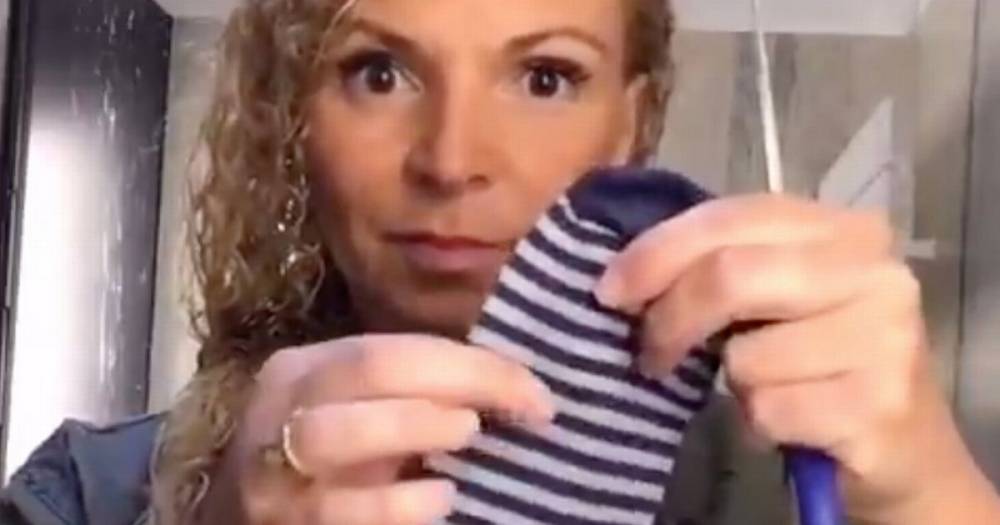Woman accused of 'witchcraft' as she shows how to turn sock into a face covering - mirror.co.uk - Britain