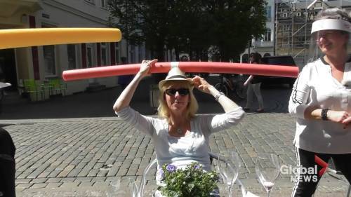 Coronavirus outbreak: German cafe introduces pool-noodle hats to demonstrate social distancing - globalnews.ca - Germany