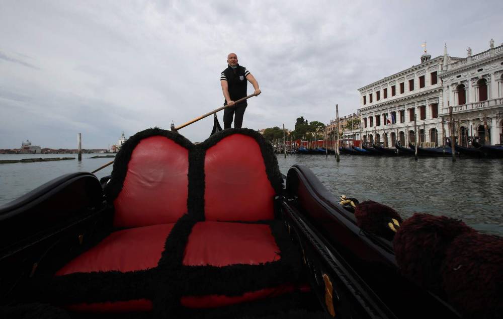 Virus lockdown gives Venice a shot at reimagining tourism - clickorlando.com