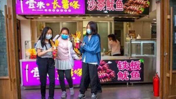 Coronavirus: Beijing announces wearing masks outdoors not necessary - livemint.com - China - county Centre