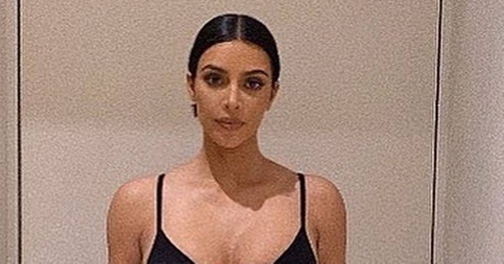 Kim Kardashian-West flaunts tiny waist in bra after intense lockdown workout - dailystar.co.uk
