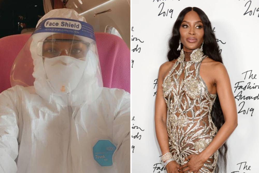 Supermodel Naomi Campbell boards plane wearing a full hazmat suit with goggles and mask - thesun.co.uk