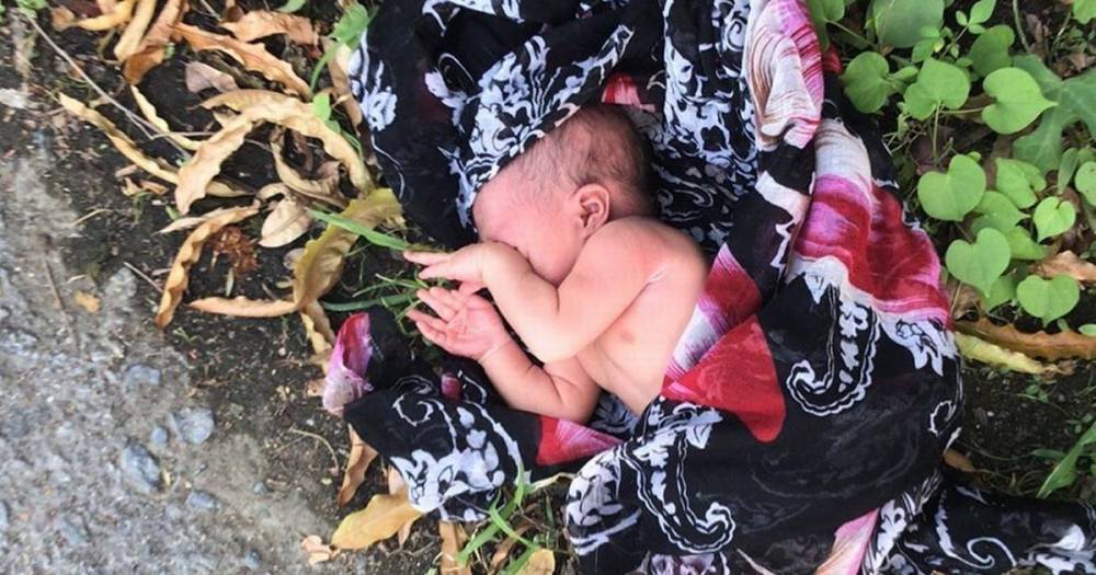 Newborn baby abandoned at side of road found alive after man heard her crying - mirror.co.uk - Thailand - Usa
