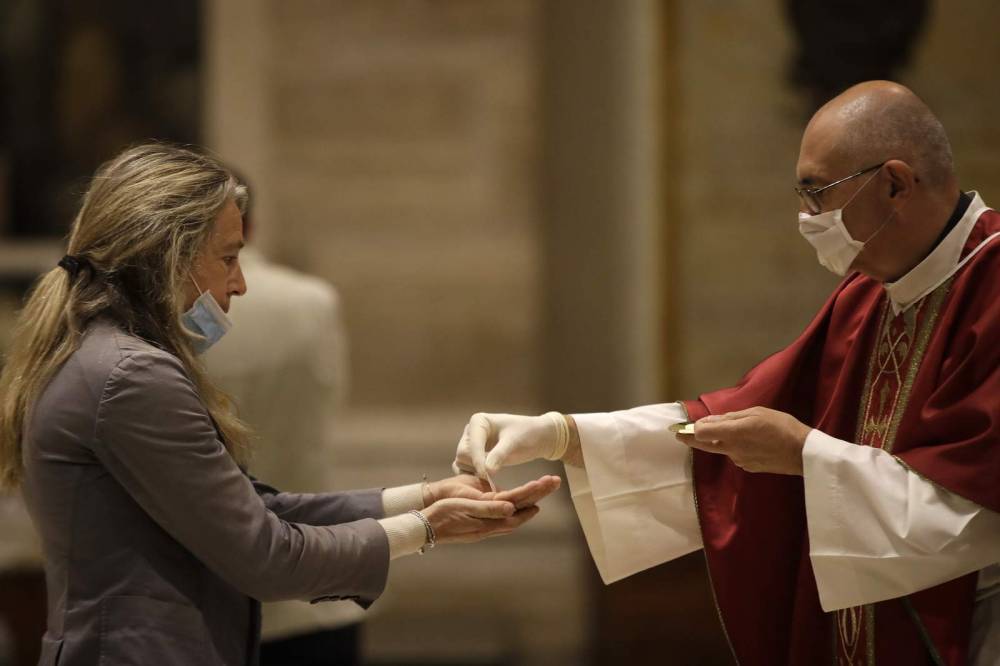 John Paul II (Ii) - Italy opens churches as virus rules dictate how to eat, pray - clickorlando.com - Italy - Vatican - city Across
