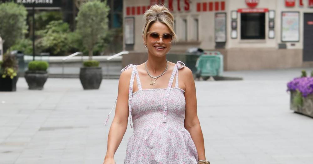 Spencer Matthews - Vogue Williams proudly shows off her blossoming baby bump as she steps out in a stunning summer dress - ok.co.uk