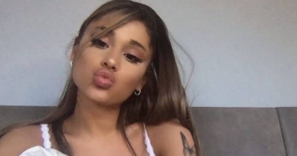 Ariana Grande flaunts some of her 48 tattoos as she slips to racy lace negligee - dailystar.co.uk