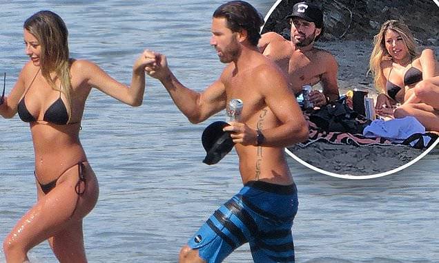 Brody Jenner - Topless Brody Jenner hits crowded Malibu beach with new woman - dailymail.co.uk - city Malibu
