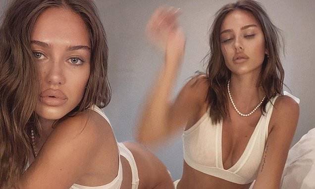 Kim Kardashian - Delilah Hamlin bares her cleavage and flat tummy in a sizzling set of Skims mesh lingerie - dailymail.co.uk