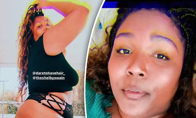 Lizzo flaunts her curves in crop top and thong underwear as she shares racy snaps to Instagram - dailymail.co.uk