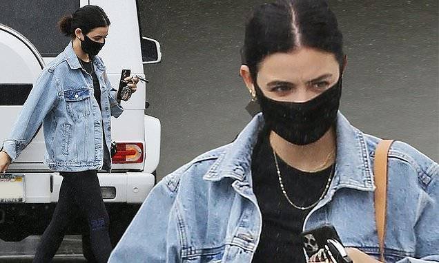 Lucy Hale - Katy Keene - Lucy Hale covers up in a denim jacket as she gets caught in the rain while running errands in LA - dailymail.co.uk - Los Angeles - Australia