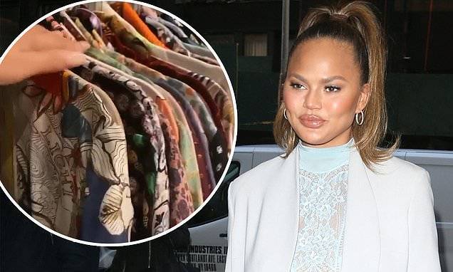 Chrissy Teigen - Chrissy Teigen shows off endless collection of robes in massive closet: 'These are what I live in' - dailymail.co.uk