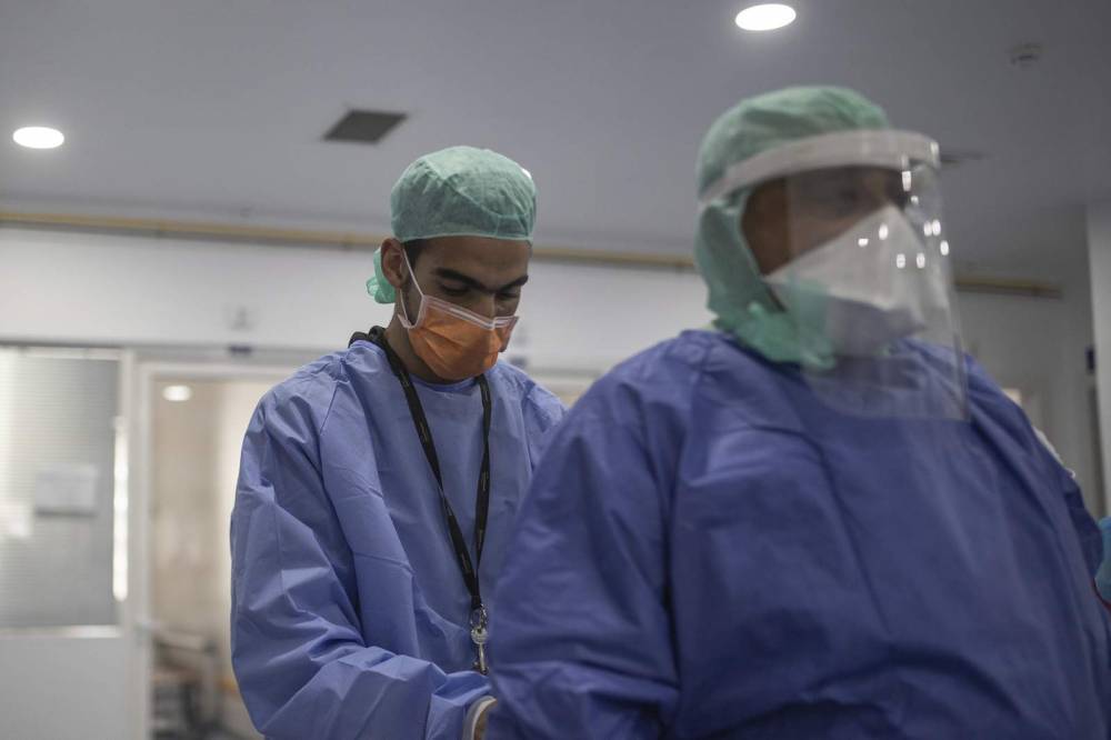 Weary Moroccan medics fight virus, nightmares and tears - clickorlando.com - Morocco - Muslim