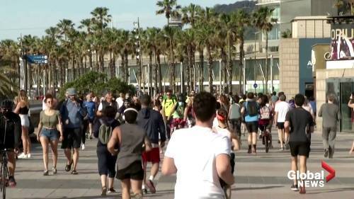 Coronavirus outbreak: Spain see’s large crowds of people outside after restrictions eased after 49 days - globalnews.ca - Spain