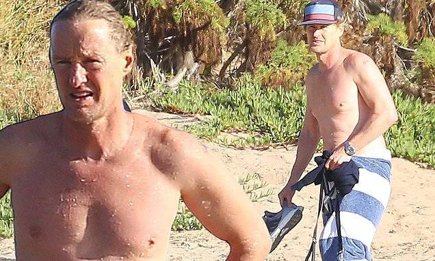 Owen Wilson - Owen Wilson enjoys a dip in the ocean during outing in Malibu after LA County reopens beaches - dailymail.co.uk - county Los Angeles - city Malibu