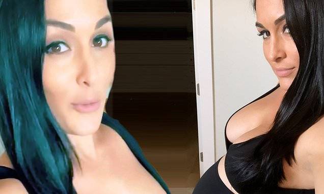 Nikki Bella - Artem Chigvintsev - Daniel Bryan - Nikki Bella shows off baby bump as she dishes 'extreme swelling' in third trimester - dailymail.co.uk