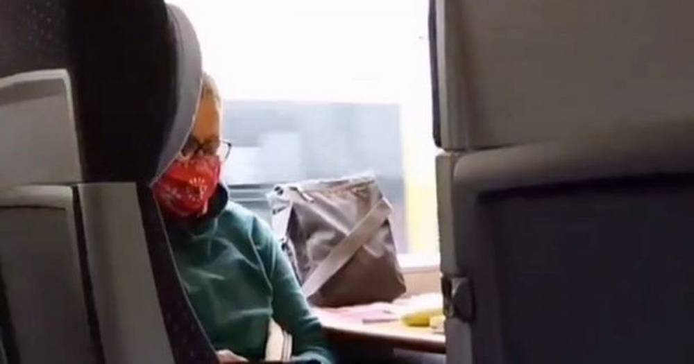 Masked woman disgusts fellow train passengers with 'gross' foot habit - mirror.co.uk - Germany - city Berlin