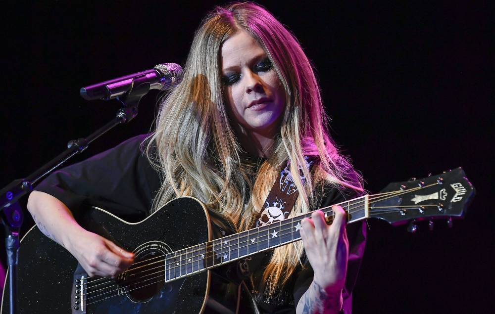 Avril Lavigne - See ya later, boi: Avril Lavigne reschedules UK tour for 2021 - nme.com - Britain - city Manchester
