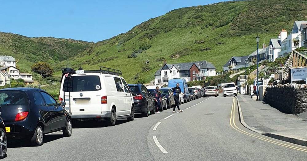Traffic wardens 'run out of tickets' as cars ditched in hottest day beach chaos - dailystar.co.uk