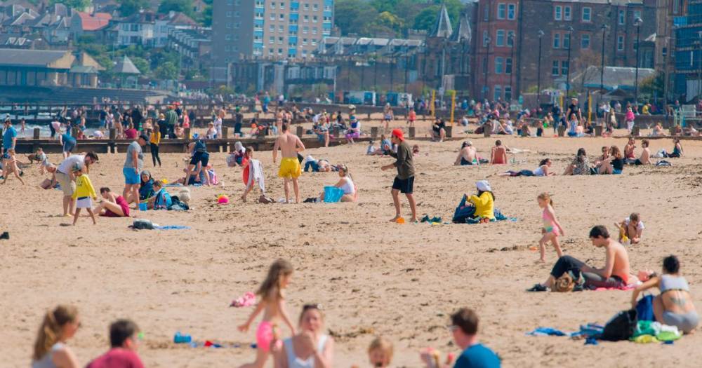 Nicola Sturgeon - Hundreds of Scots at Edinburgh's Portobello Beach flout lockdown rules to bask in warm weather - dailyrecord.co.uk - Scotland