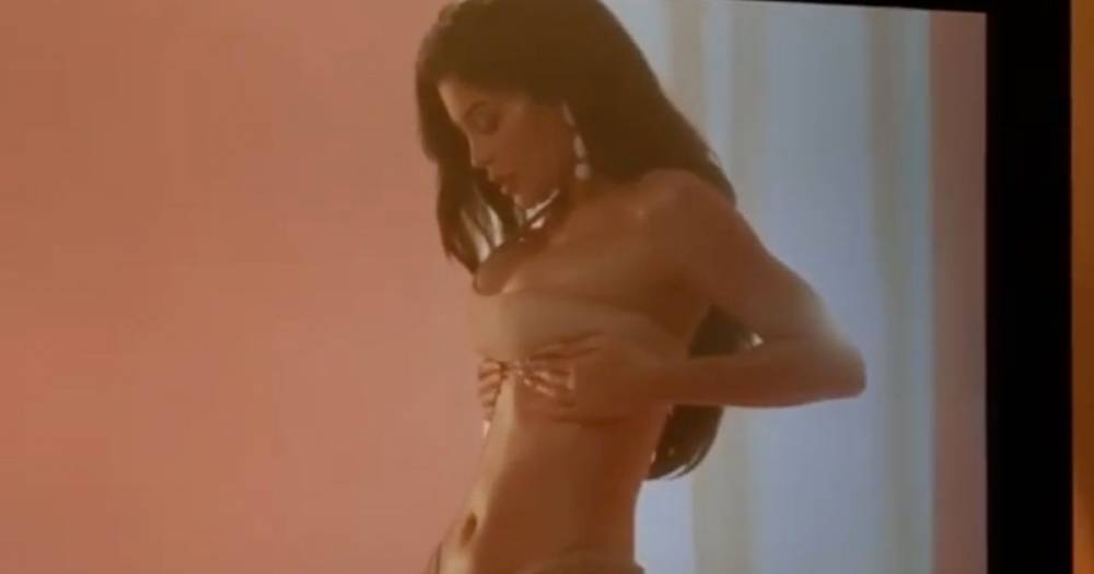 Kylie Jenner - Khloe Kardashian - Kylie Jenner shows her tiny waist as she strips to a bikini in raunchy sunscreen advert - mirror.co.uk