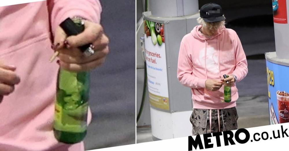 Megan Fox - Machine Gun Kelly seen ‘smoking’ at petrol station after releasing Bloody Valentine video with Megan Fox - metro.co.uk