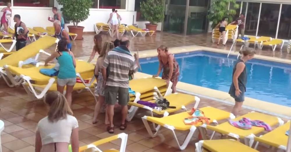 Scots holidaymakers face sunbed wars as resorts limit loungers at hotel poolside - dailyrecord.co.uk - Italy - Spain - Britain - Scotland - Greece - Turkey