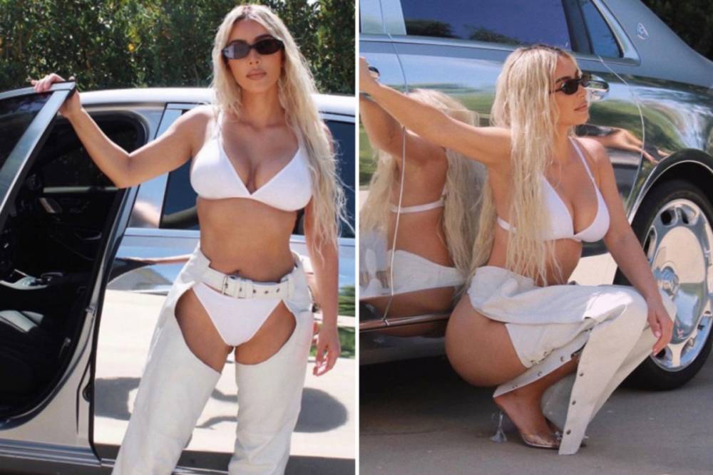 Kim Kardashian - Kim Kardashian shows off her figure in white lingerie and a pair of leather cowboy chaps in sizzling new snaps - thesun.co.uk
