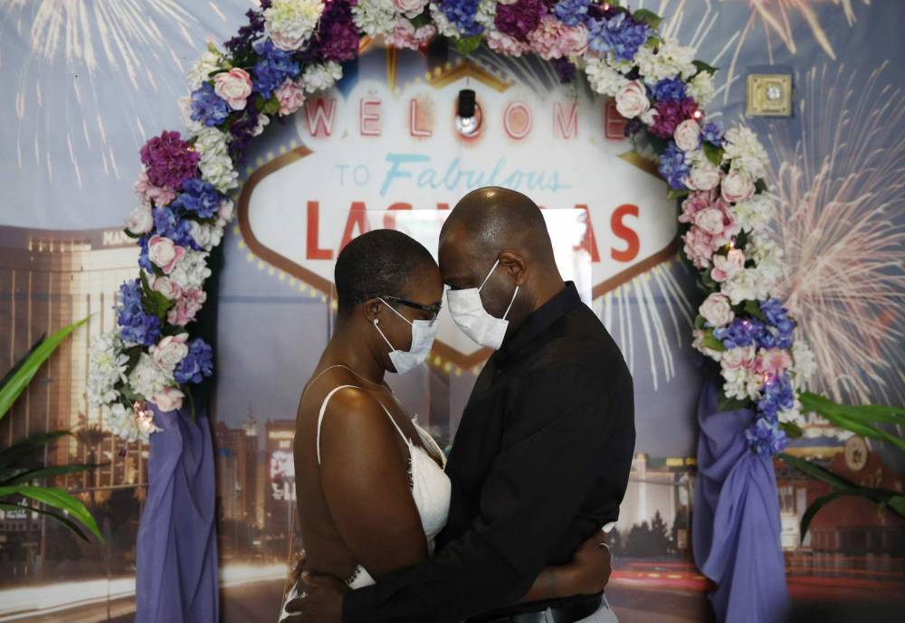 Using face masks and sanitizer, couples say ‘I do’ in Vegas - clickorlando.com - city Las Vegas - city Chicago